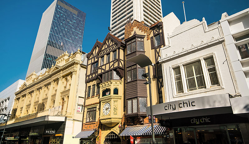 Image of shops and offices in a typical high street. Click for a commercial property insurance quote now.
